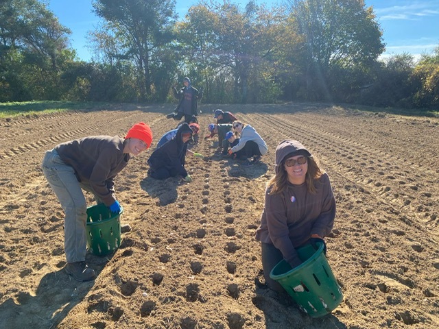 Madi and apprentices in field