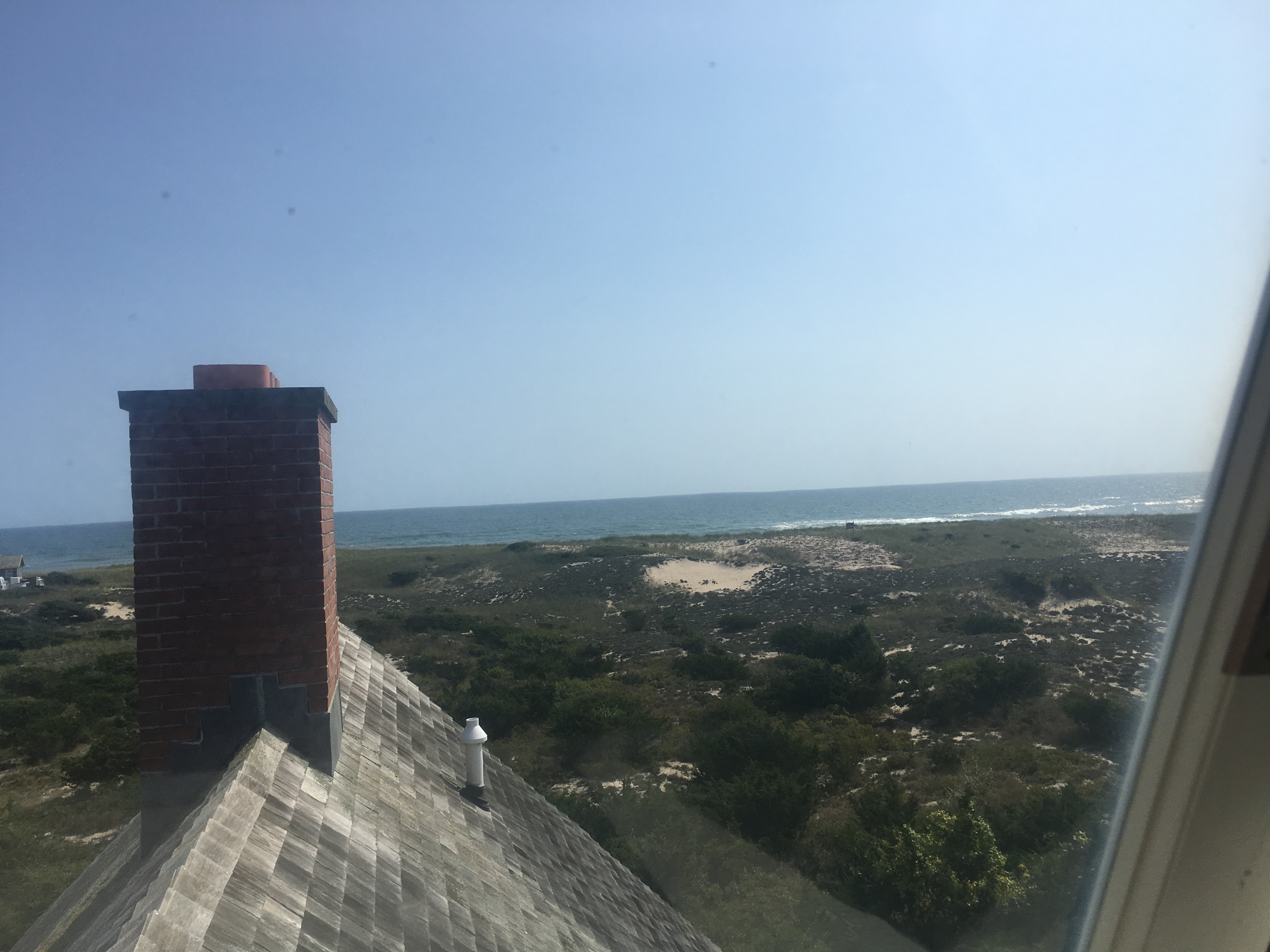 View out the window towards the ocean of the Amagansett Life-Saving Station