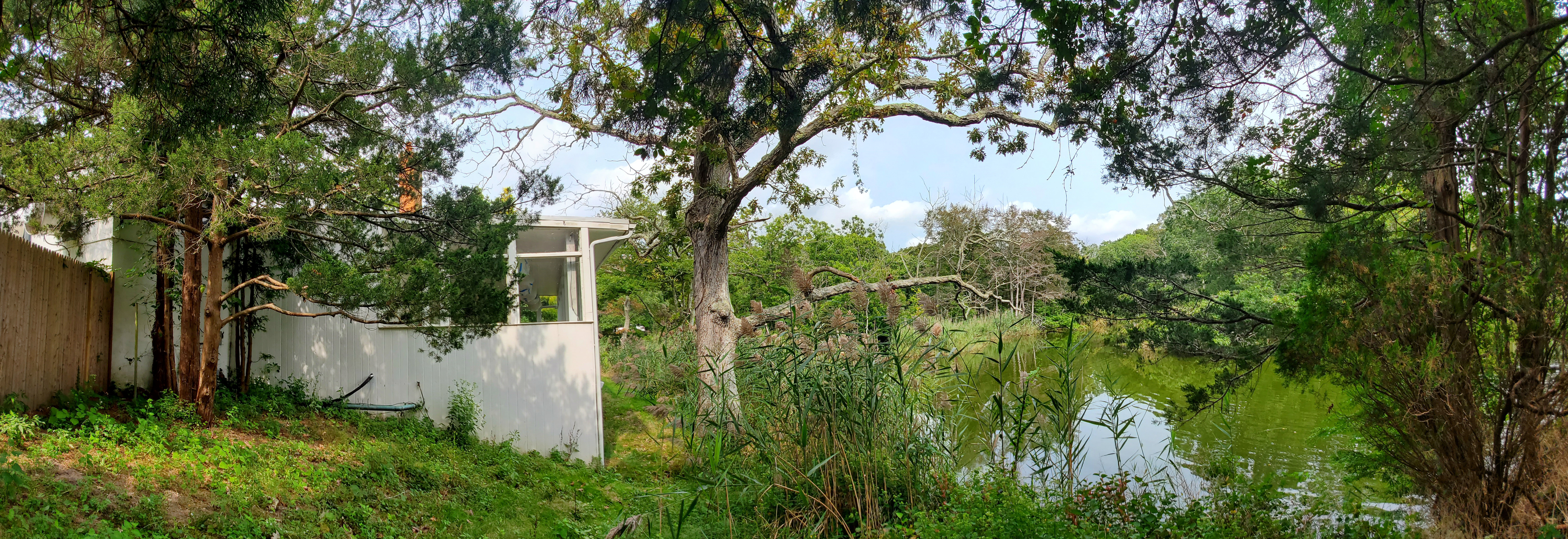 Georgica Pond panorama view with white building to be demolished
